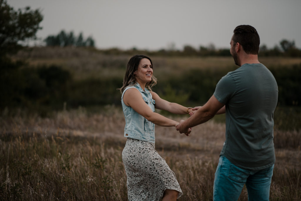 laughing during engagement session