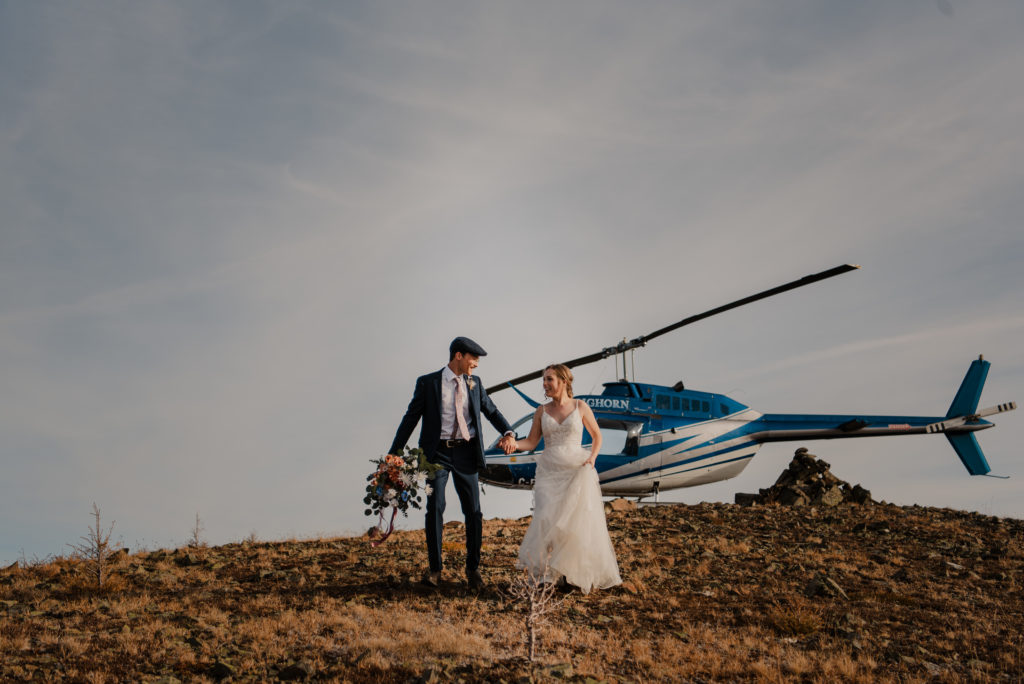 helicopter elopement on top of a mountain with bride and groom