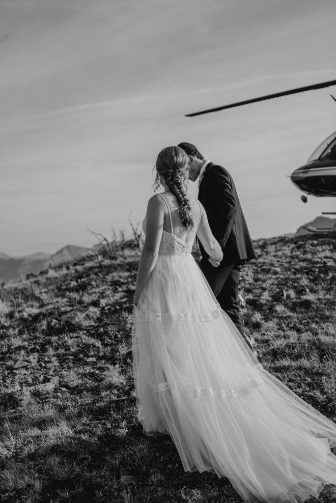 sunset mountain top bride and groom portraits
