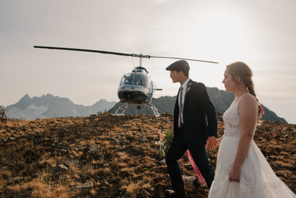 helicopter elopement on top of a mountain with bride and groom