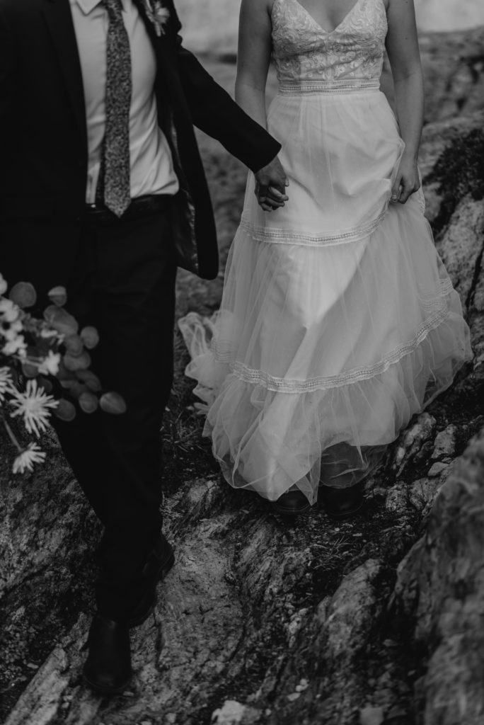 black and white photo of bride and groom during elopement