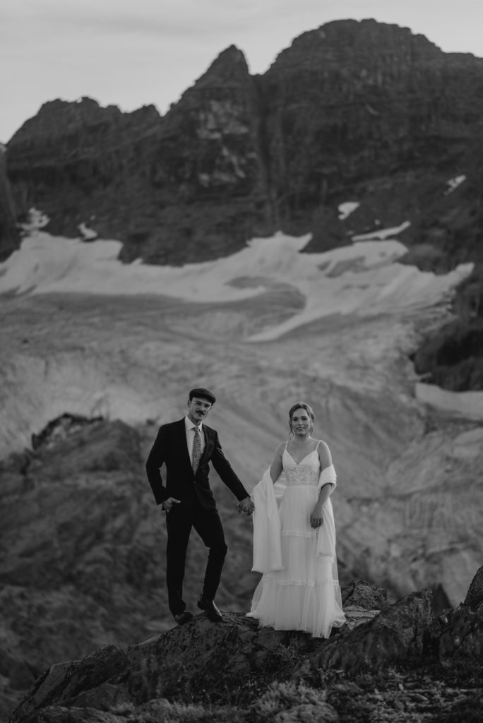 stunning black and white bride and groom on a mountain top in BC