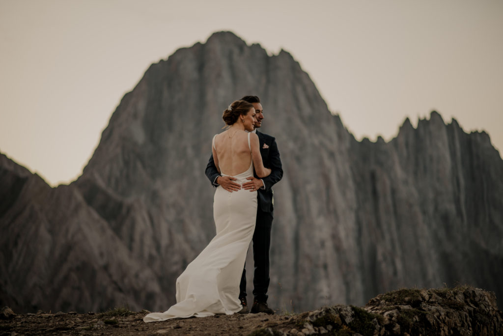 Wedding couple just married in the mountains in Alberta. 