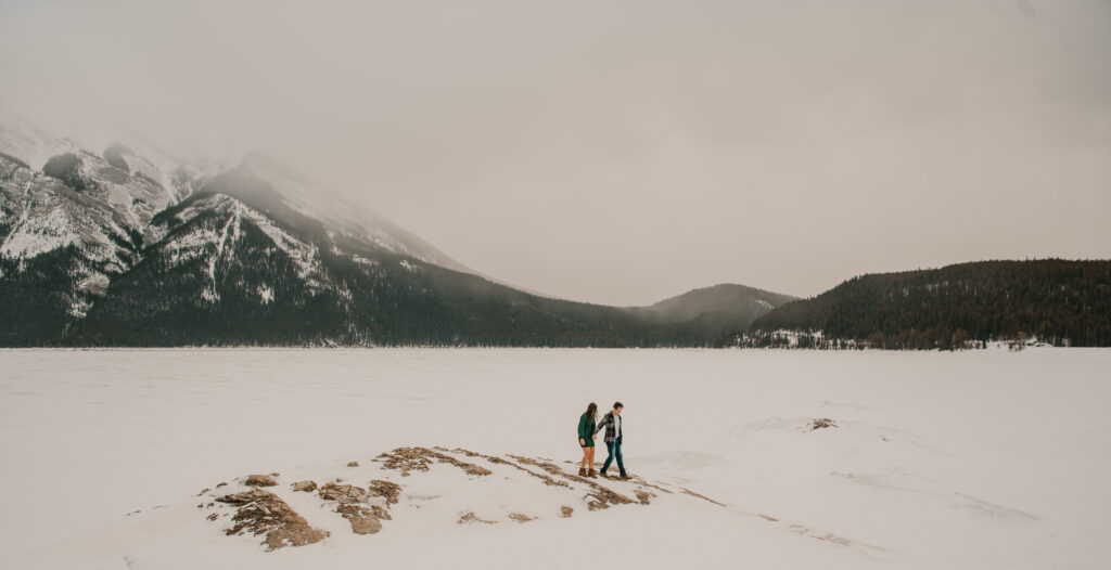 Lake Minnewanka winter engagement session in Banff Alberta