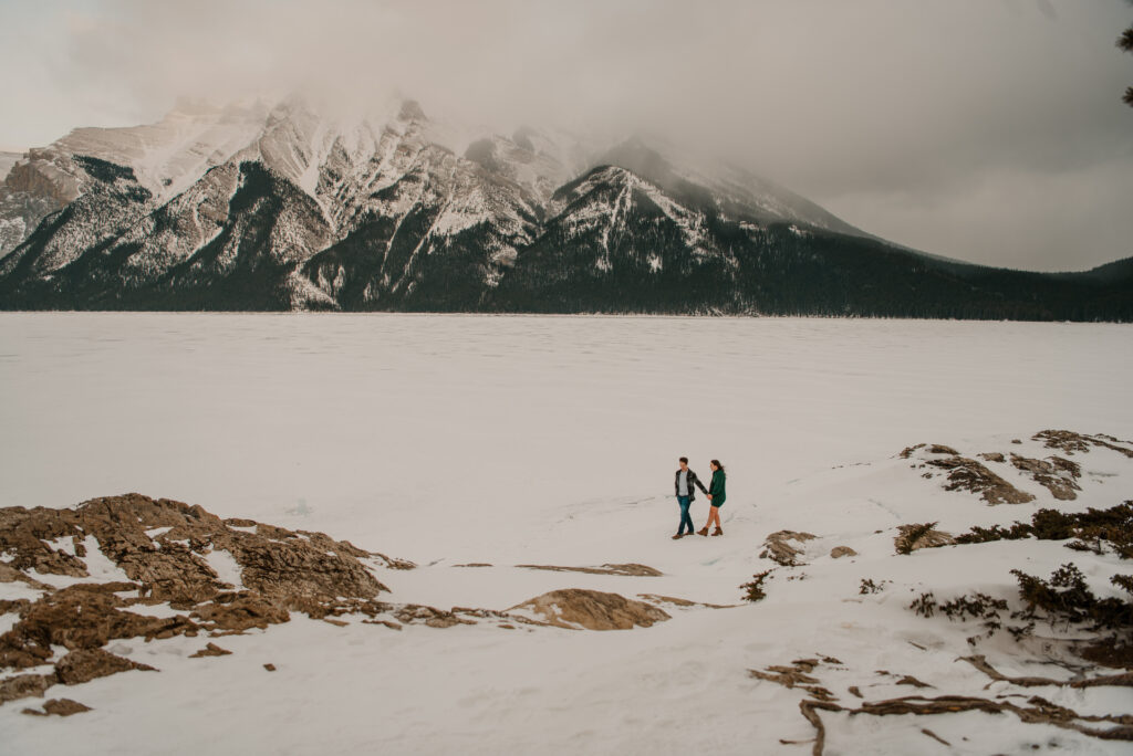 sunset winter engagement session in Banff
