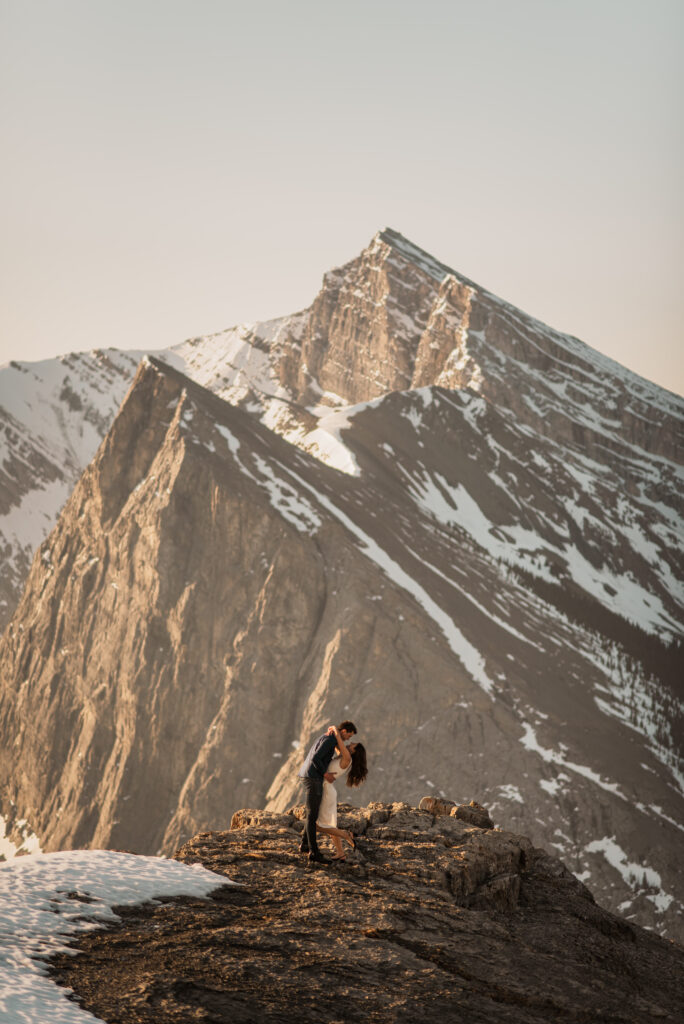 sunrise couple's photos on a mountain