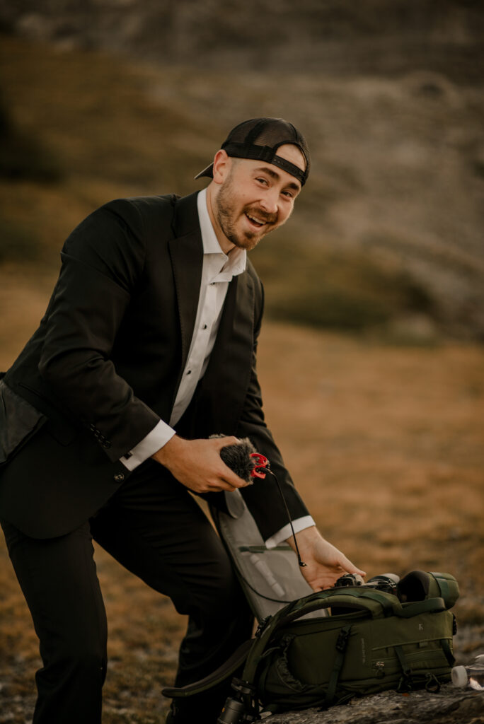 groom on a mountain about to get married
