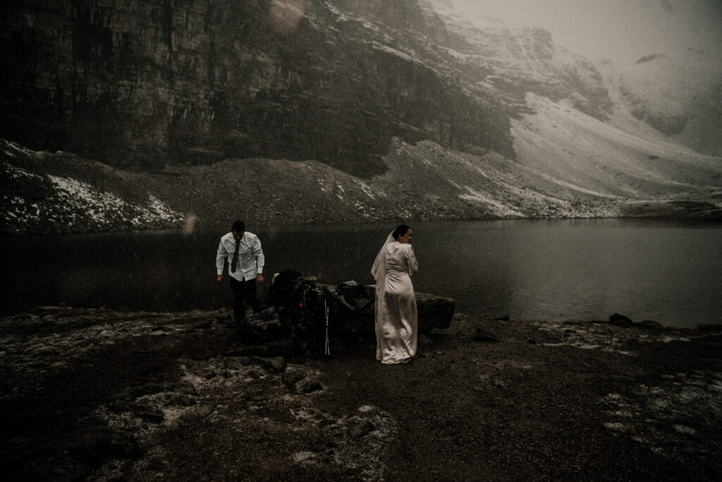 getting ready wedding photos by a lake banff alberta