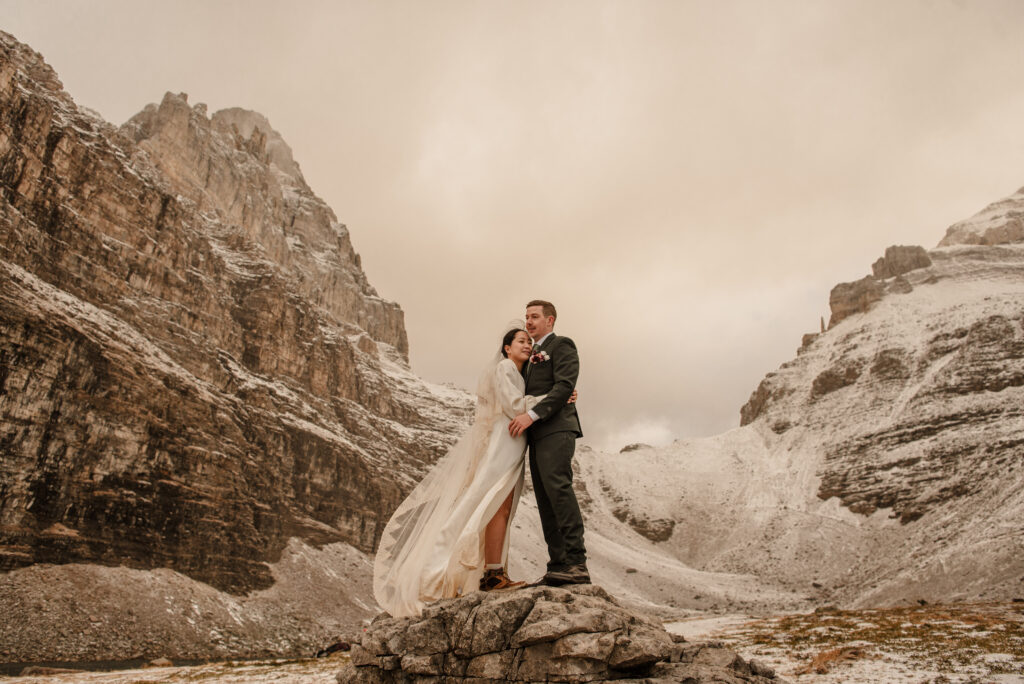 adventurous couple hiking elopement