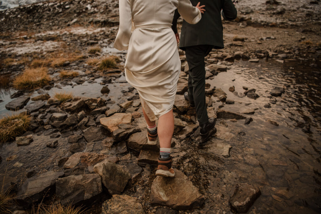 adventurous couple hiking elopement