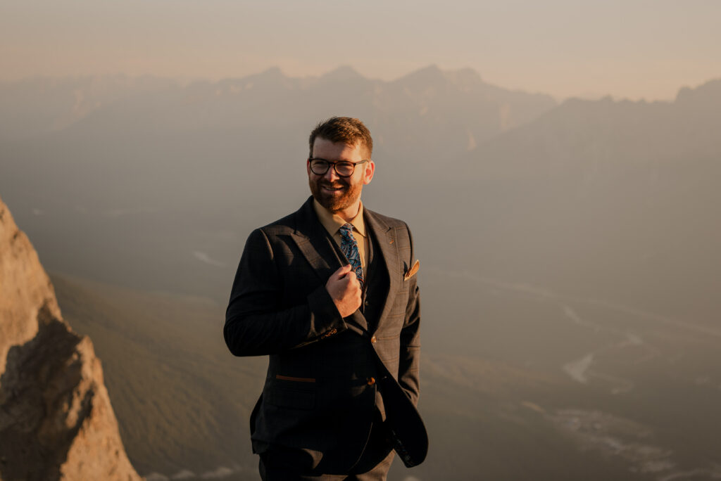 groom on a mountain in canmore 