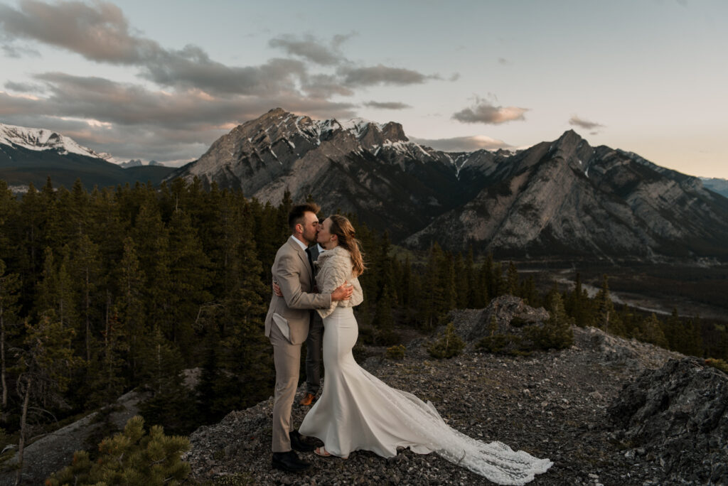 bride and groom mountain top sunrise elopement ceremony