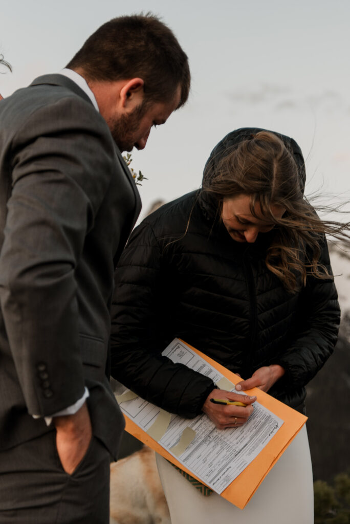 bride and groom mountain top sunrise elopement ceremony