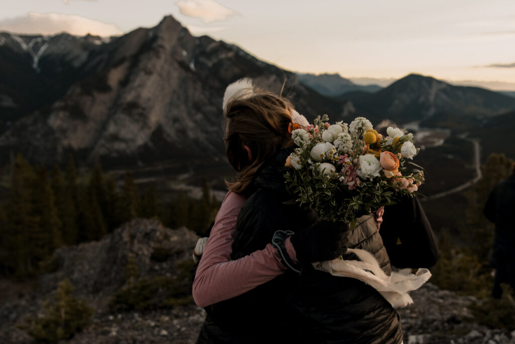 bride and groom mountain top sunrise elopement ceremony