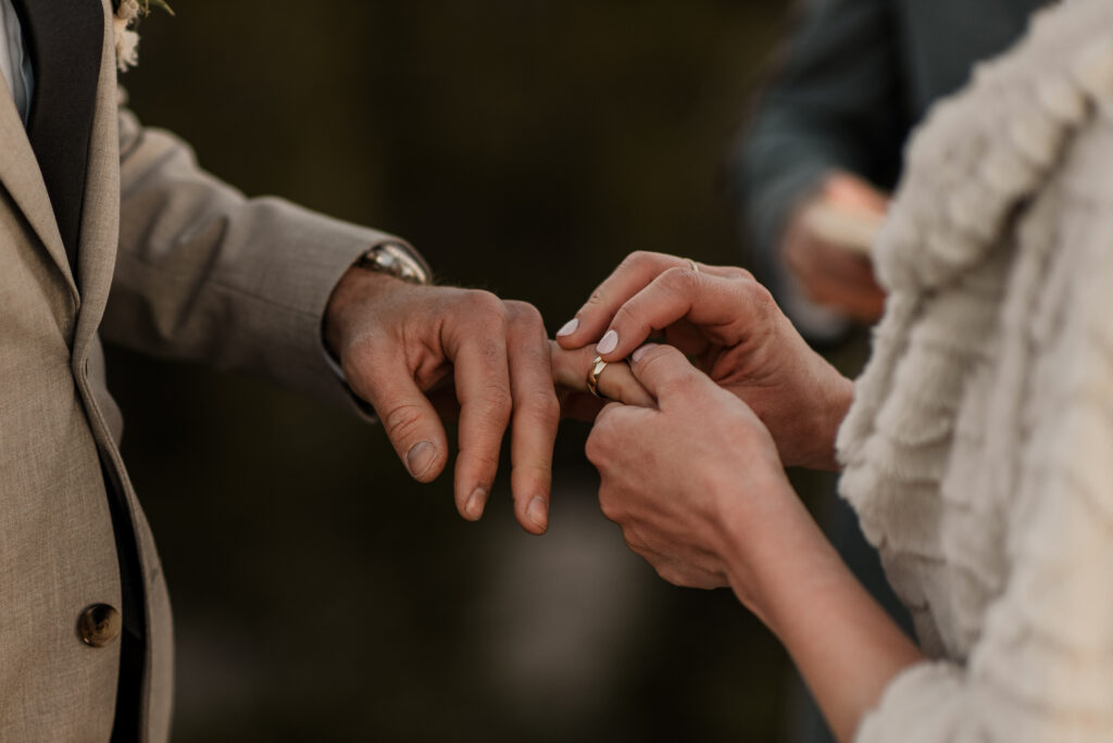 bride and groom mountain top sunrise elopement ceremony