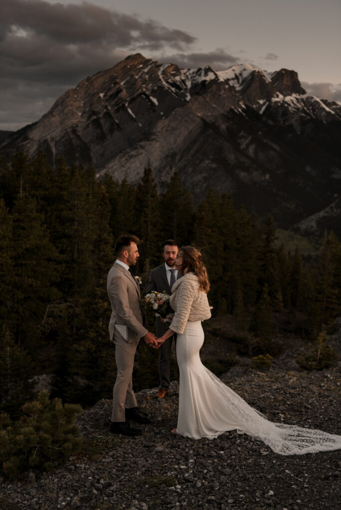 bride and groom mountain top sunrise elopement ceremony