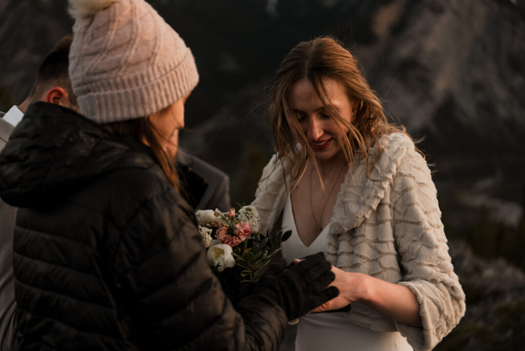 bride and groom mountain top sunrise elopement ceremony