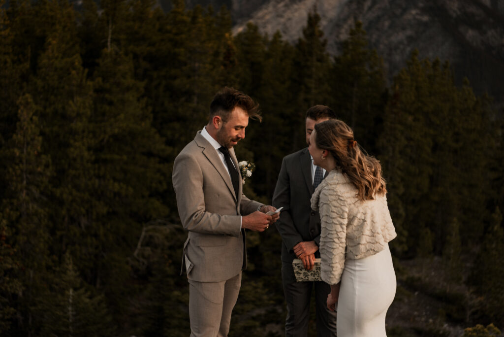 bride and groom mountain top sunrise elopement ceremony