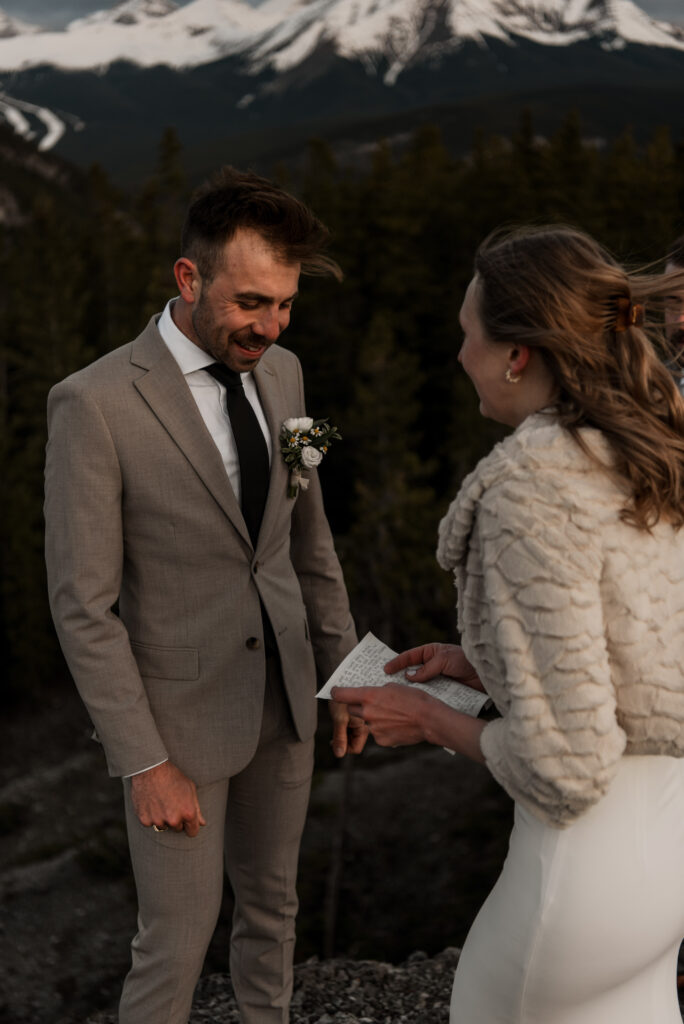 bride and groom mountain top sunrise elopement ceremony