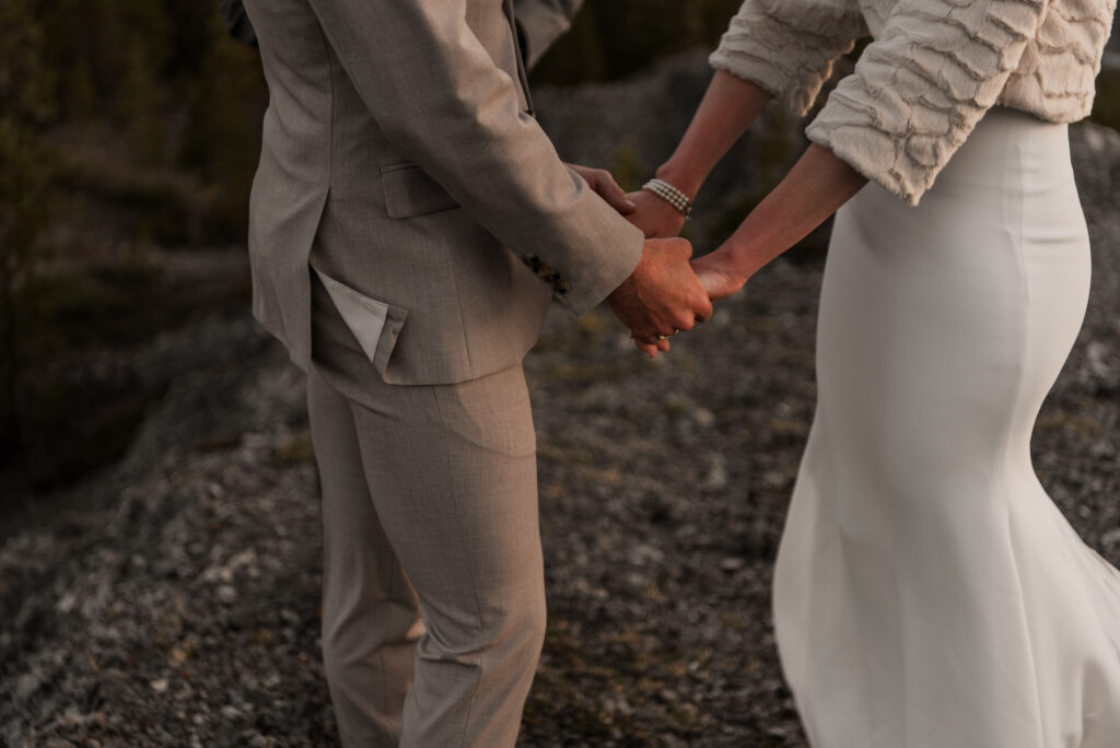 bride and groom mountain top sunrise elopement ceremony