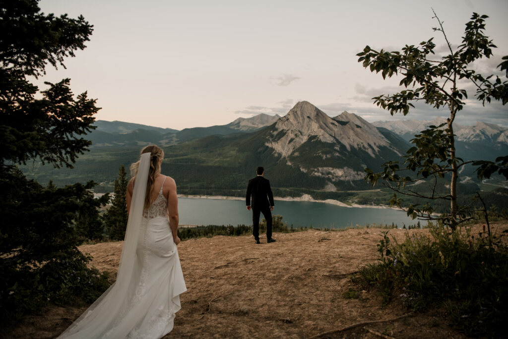 first look on a mountain at sunrise for an elopement