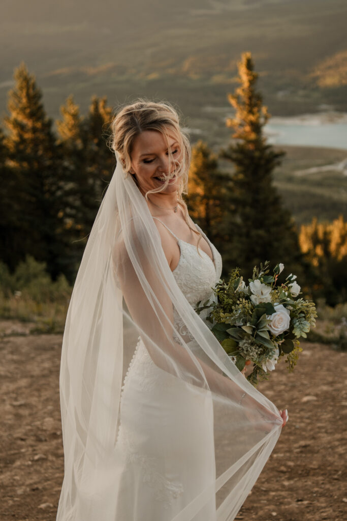 bride on a mountain for her elopement