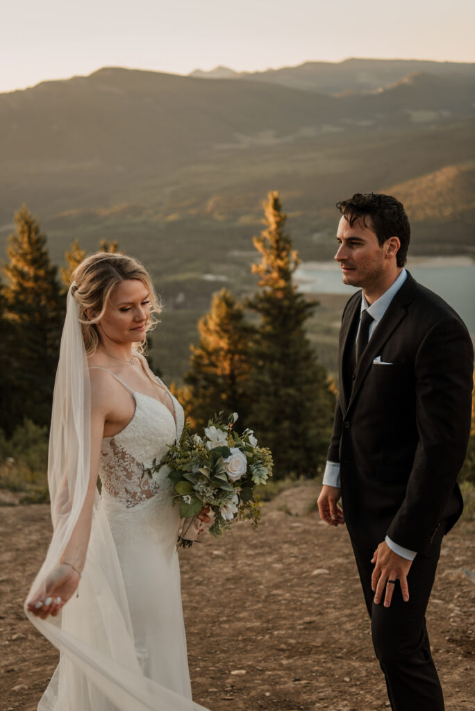 bride and groom sunrise hiking elopement in Alberta