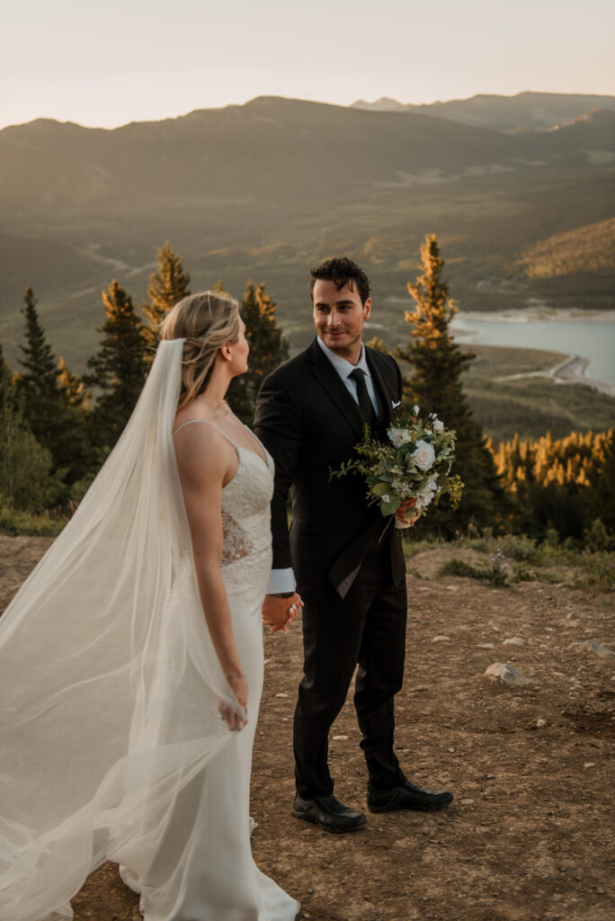 bride and groom sunrise hiking elopement in Alberta