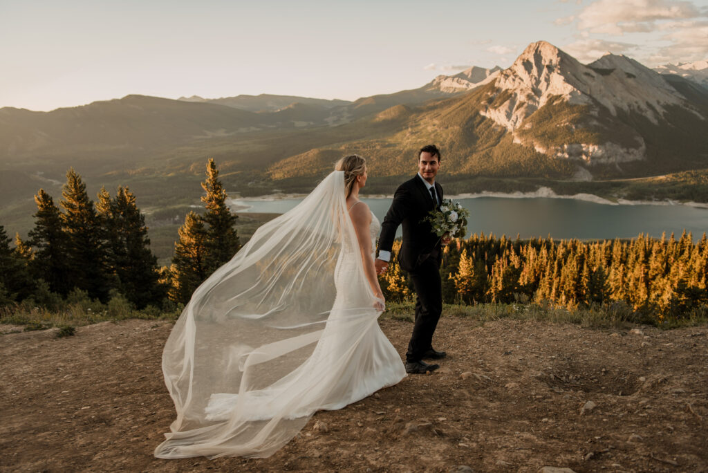 bride and groom sunrise hiking elopement in Alberta