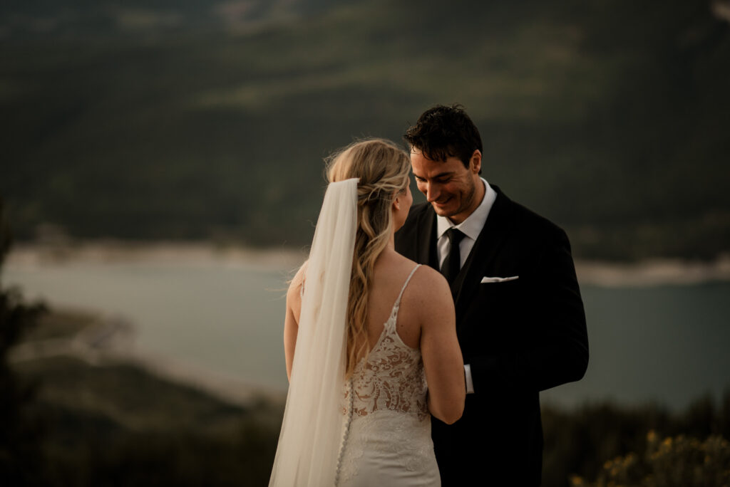 first look on a mountain at sunrise for an elopement