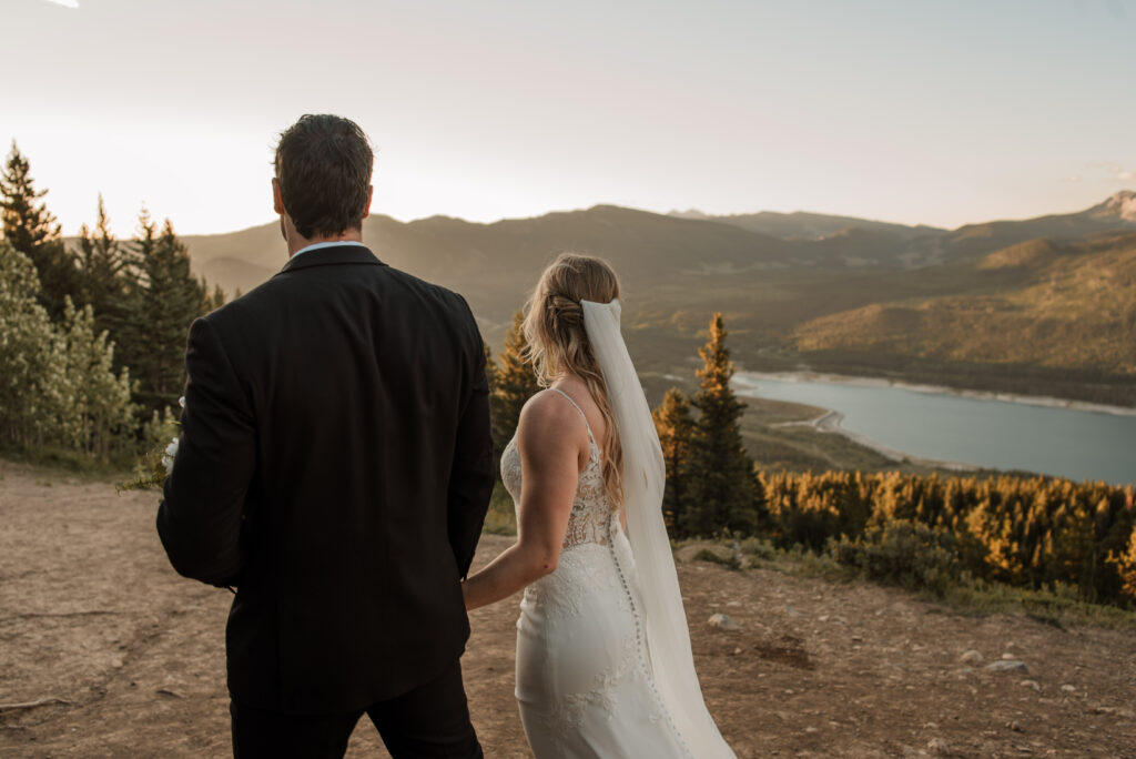 bride and groom sunrise hiking elopement in Alberta