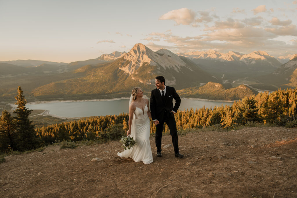 bride and groom sunrise hiking elopement in Alberta