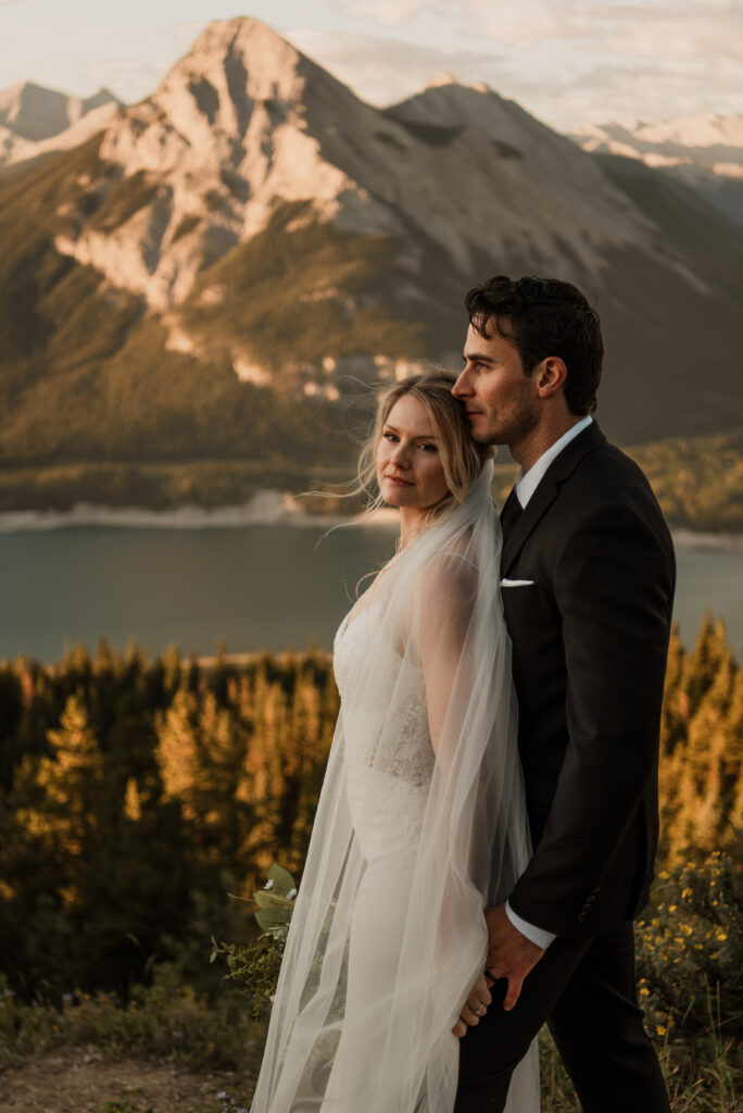 bride and groom sunrise hiking elopement in Alberta