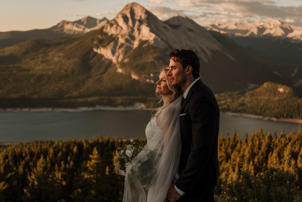 bride and groom sunrise hiking elopement in Alberta