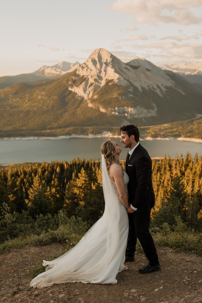 bride and groom sunrise hiking elopement in Alberta