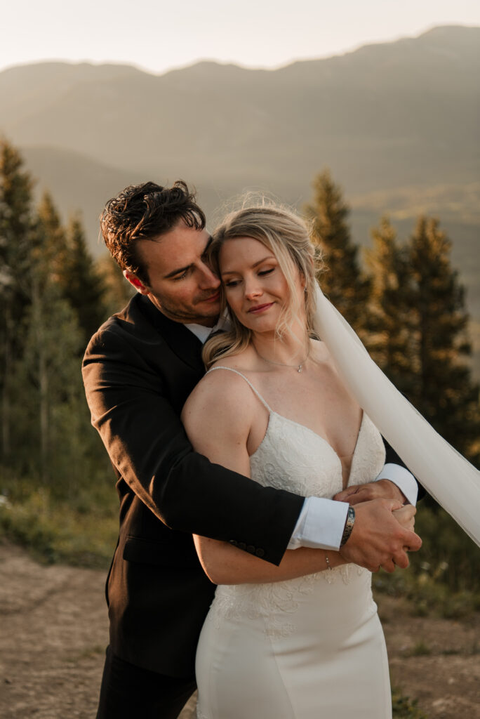 bride and groom sunrise hiking elopement in Alberta