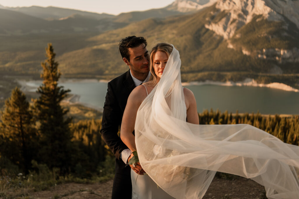 bride and groom sunrise hiking elopement in Alberta