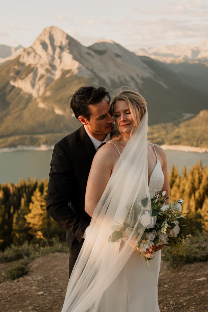 bride and groom sunrise hiking elopement in Alberta