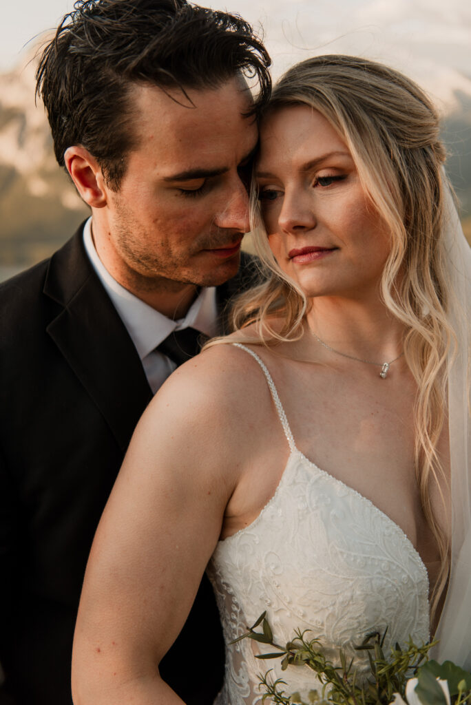 bride and groom sunrise hiking elopement in Alberta