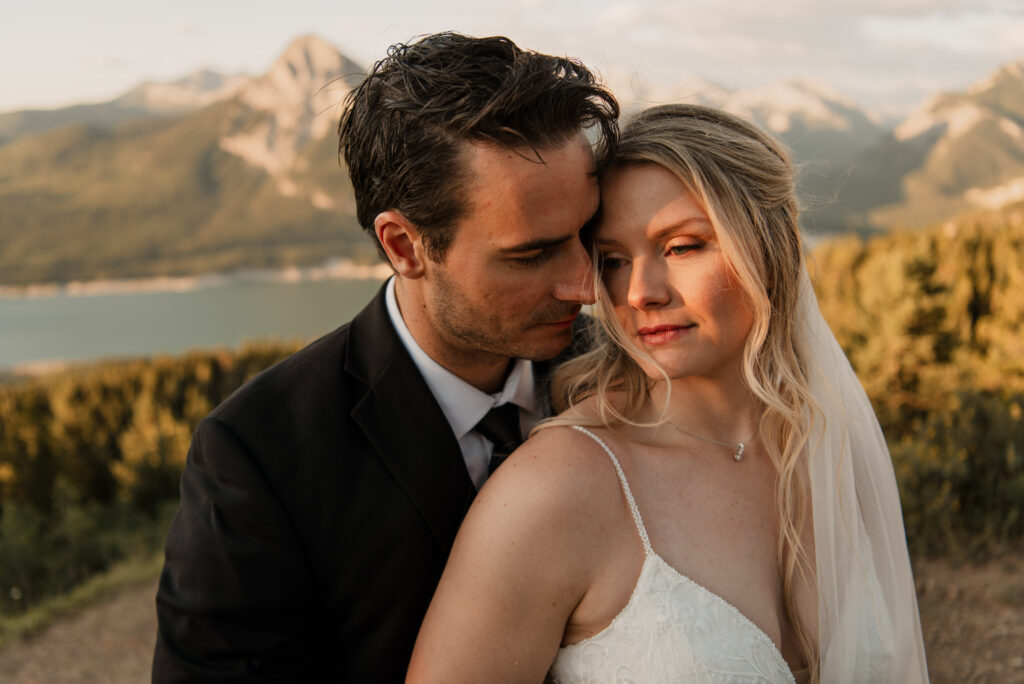 bride and groom sunrise hiking elopement in Alberta