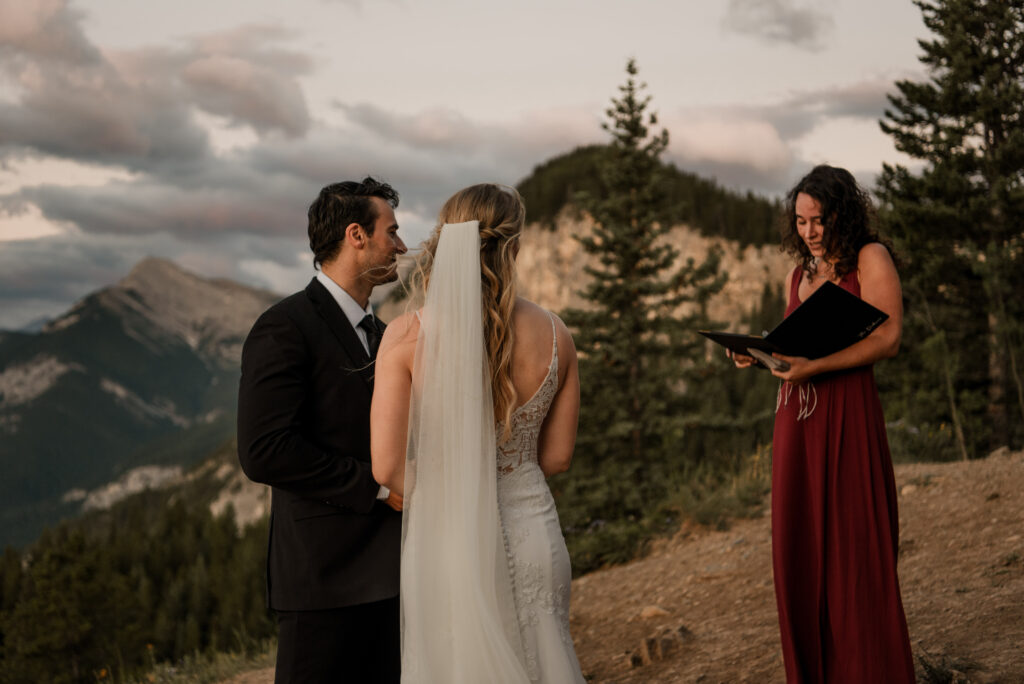 sunrise elopement ceremony on a mountain top  