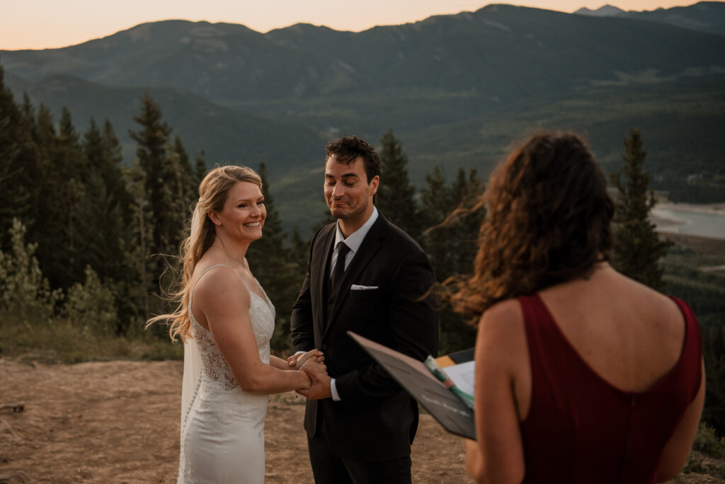 sunrise elopement ceremony on a mountain top  